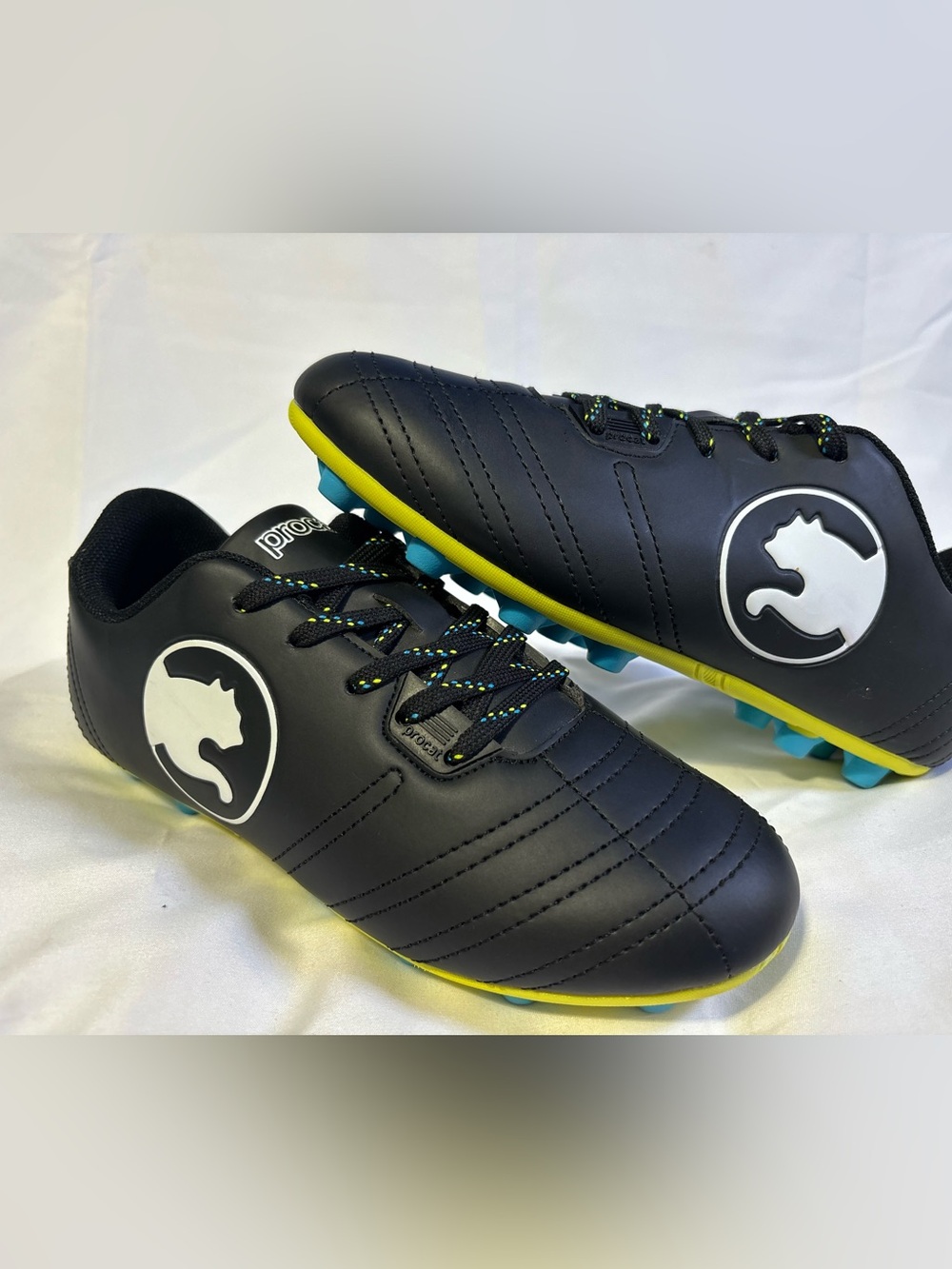 Men's Black Soccer Cleats with Yellow Trim
